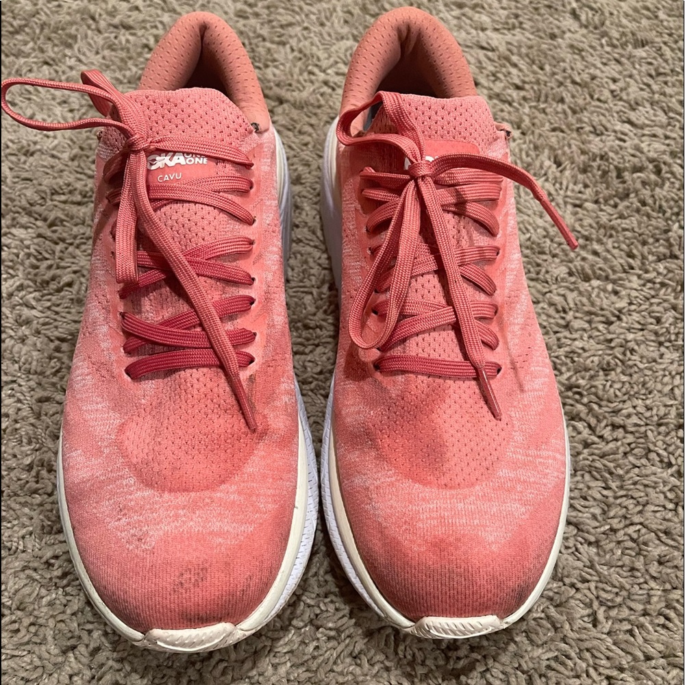 Woman’s pink Hoka one to one sneakers